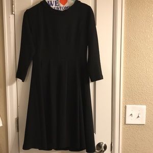 Maternity black three quarter sleeve dress.